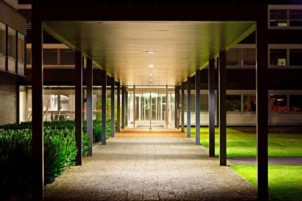 Roofed Office Building Entrance At Night